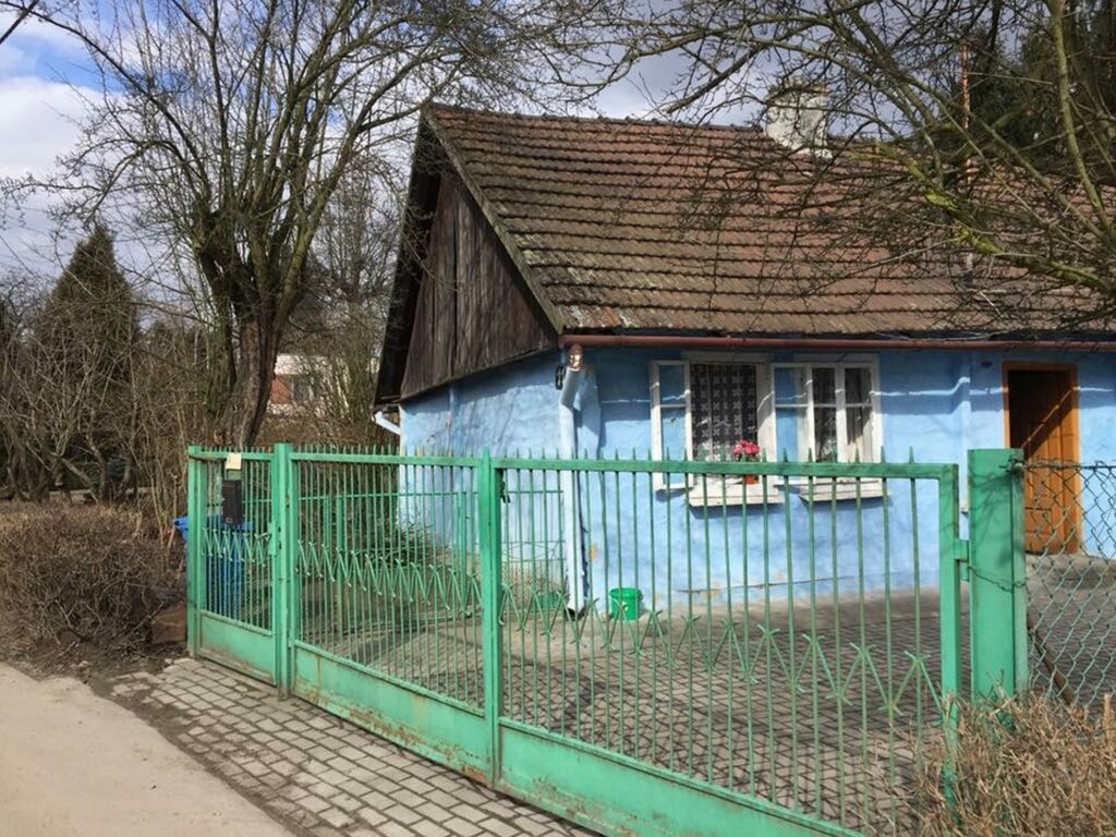 A small blue wooden house in Nowa Huta