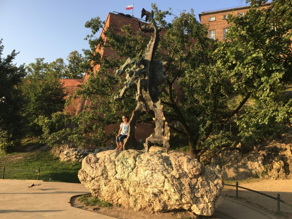 The Wawel Dragon statue below Wawel Hill